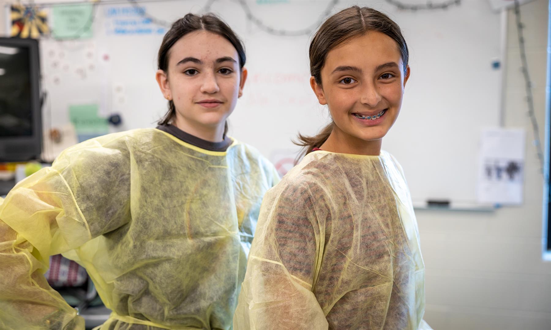 Two girls smile